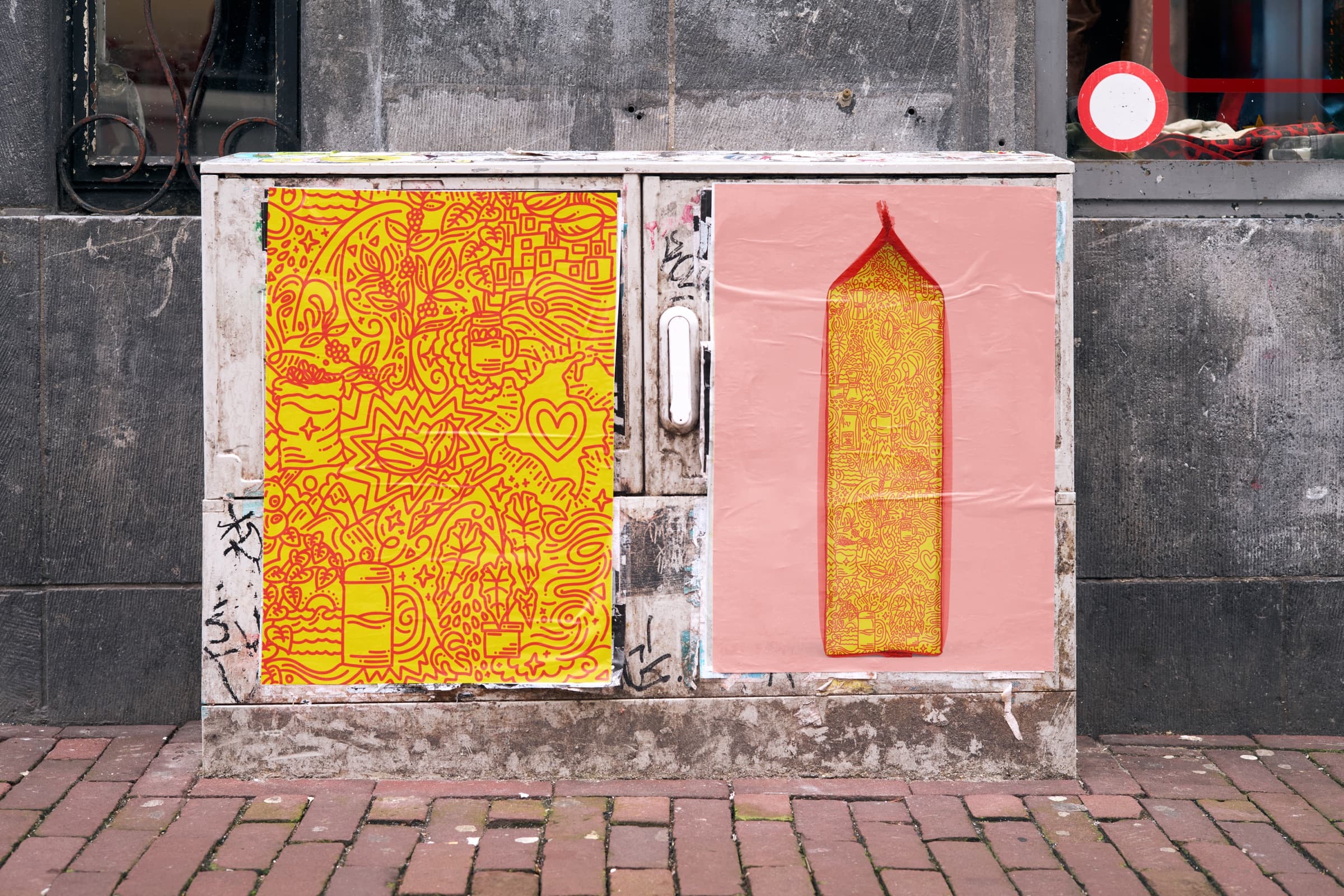 Verde posters pasted on a weathered city utility box